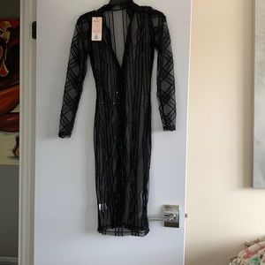 Long black see through dress. Size S from house of London